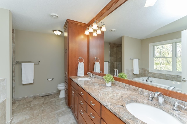 full bathroom featuring shower with separate bathtub, a textured ceiling, toilet, vanity, and tile patterned flooring