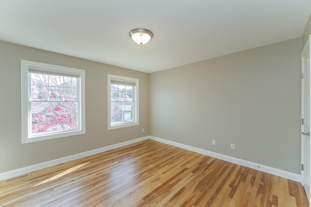 empty room featuring light hardwood / wood-style flooring