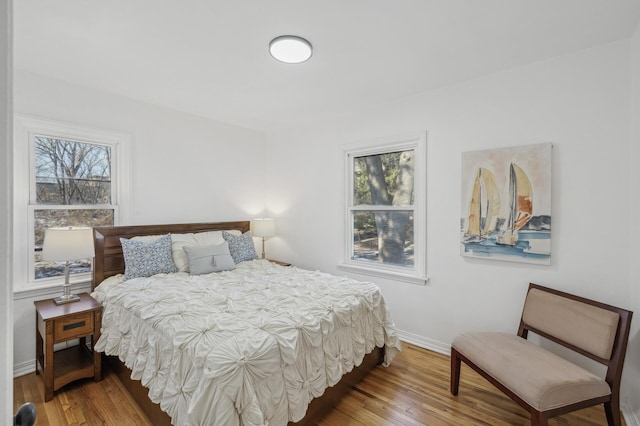 bedroom featuring wood-type flooring