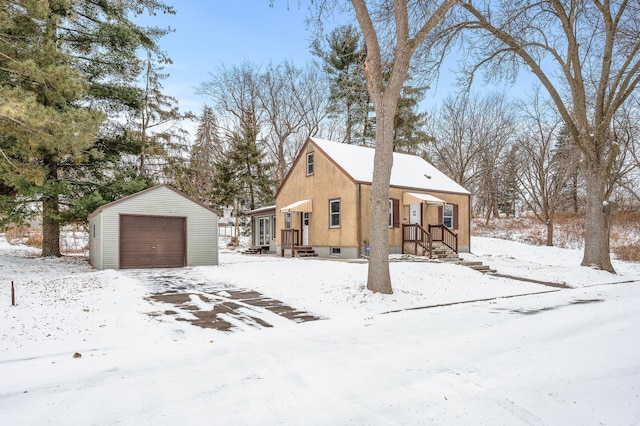 view of front of house featuring an outbuilding and a garage