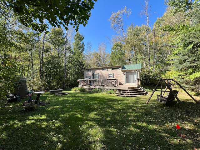 view of yard featuring a deck