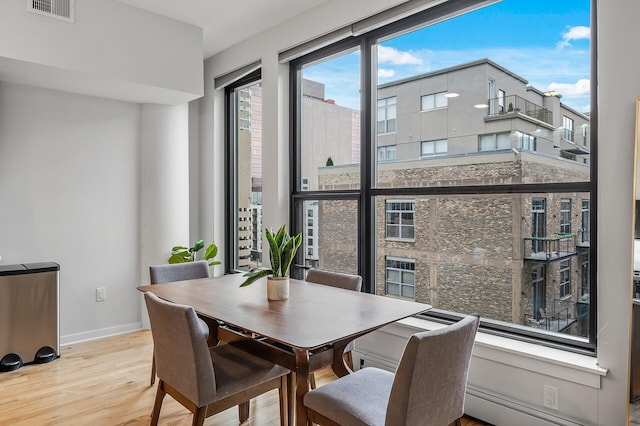 dining room featuring light hardwood / wood-style flooring