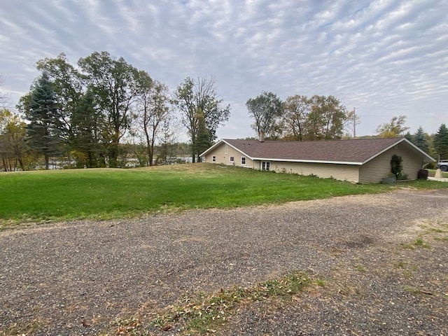 view of home's exterior featuring a lawn