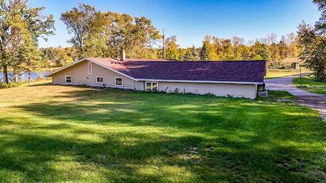 exterior space with a yard