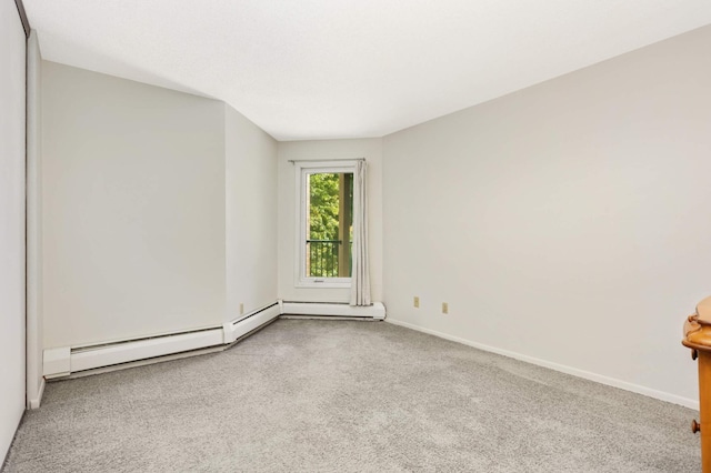 unfurnished room featuring light colored carpet