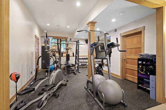 exercise area featuring decorative columns