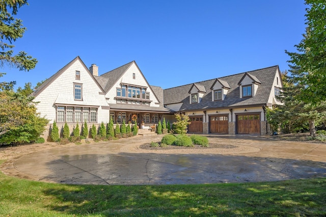 view of front of property featuring a garage