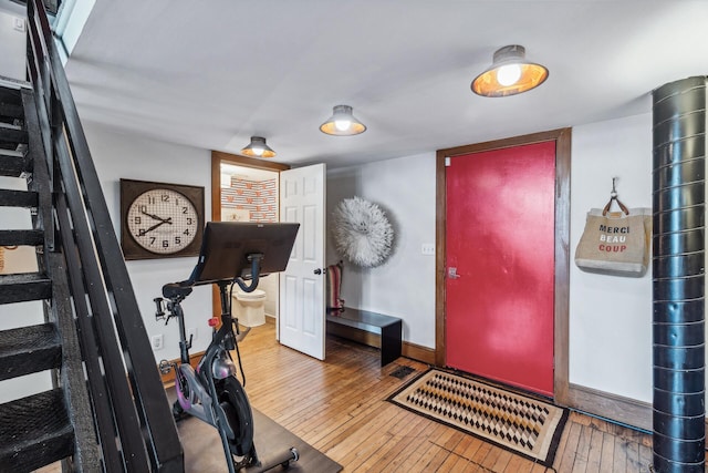 entrance foyer with hardwood / wood-style floors