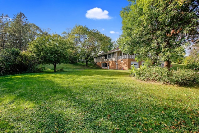 view of yard with a garage