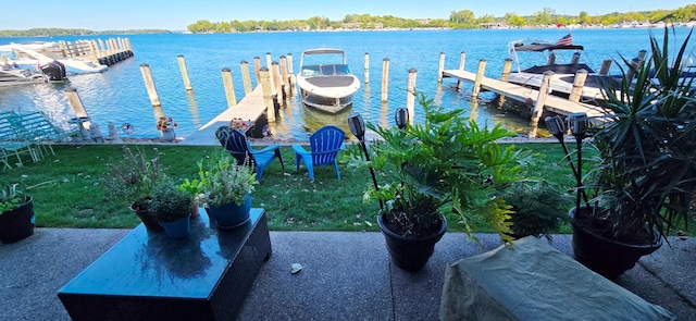 dock area featuring a water view