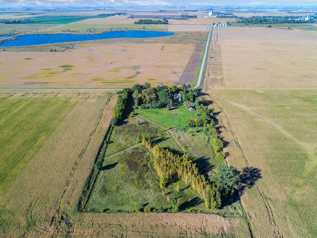 aerial view with a rural view and a water view