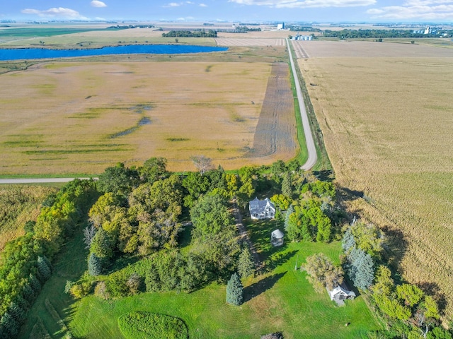 birds eye view of property featuring a rural view and a water view