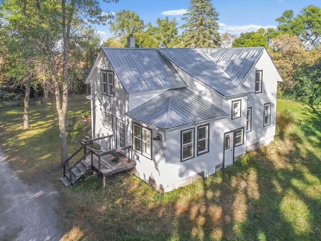 29693 120th St, Herman, MN 56248 - exterior space featuring metal roof, a chimney, and a front lawn