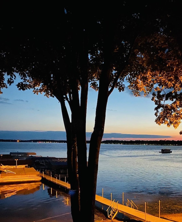 view of dock with a water view