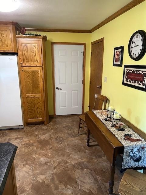 interior space featuring crown molding