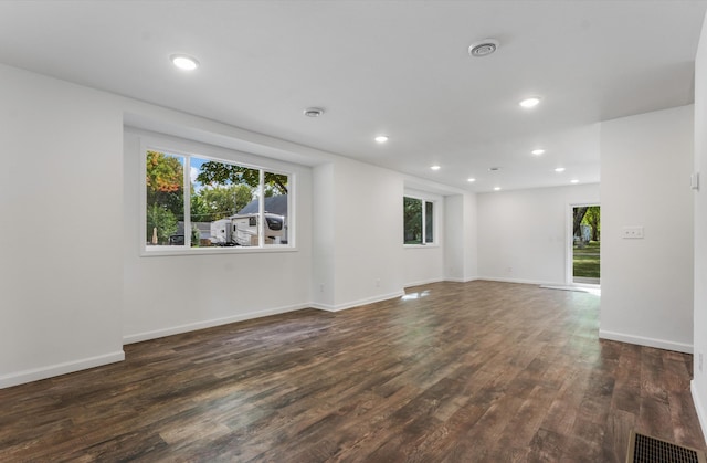 spare room featuring dark hardwood / wood-style floors