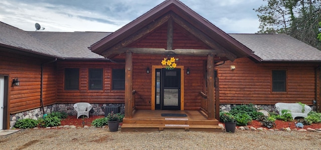 17453 Riverview Pl, Merrifield, MN 56465 - doorway to property with a shingled roof