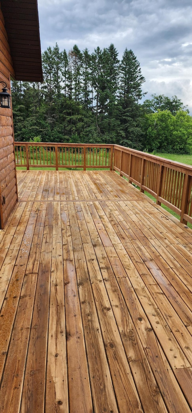 17453 Riverview Pl, Merrifield, MN 56465 - wooden terrace featuring view of scattered trees