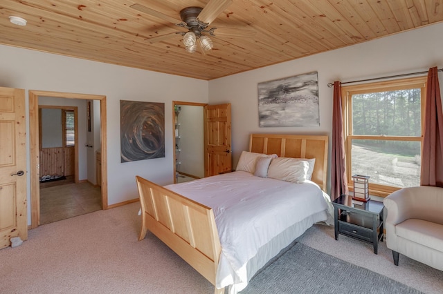 17453 Riverview Pl, Merrifield, MN 56465 - bedroom with light carpet, multiple windows, wooden ceiling, a ceiling fan, and ensuite bathroom