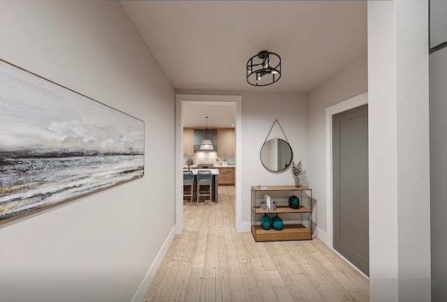 hallway featuring light hardwood / wood-style floors