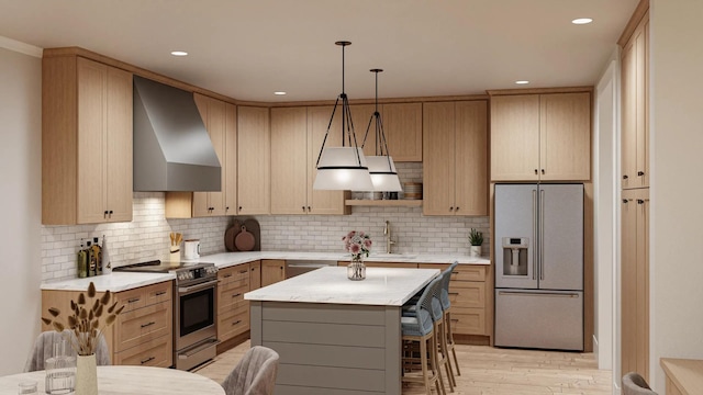 kitchen featuring stainless steel appliances, wall chimney range hood, light brown cabinets, and light hardwood / wood-style flooring