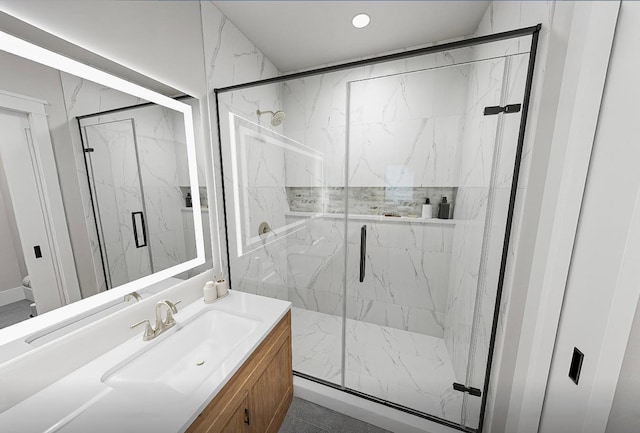 bathroom with vanity and an enclosed shower