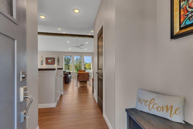 hall with light hardwood / wood-style flooring