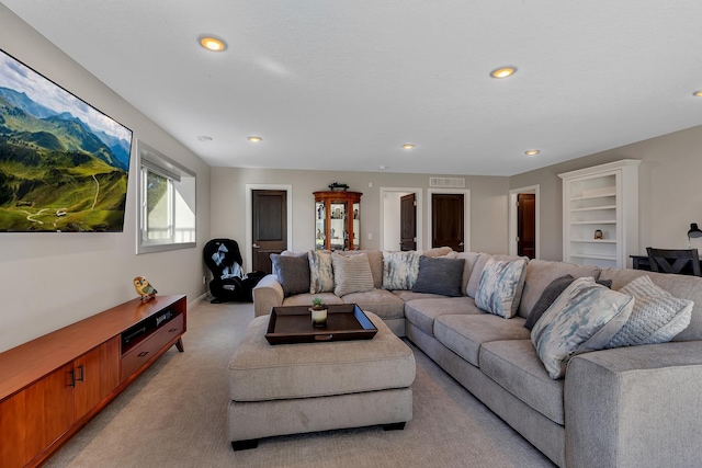 living room featuring light colored carpet