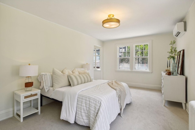 carpeted bedroom with a wall unit AC