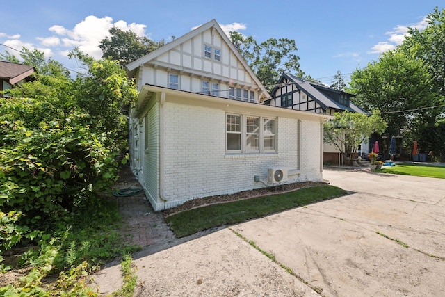 view of property exterior with ac unit