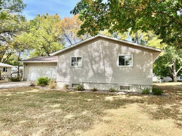 view of home's exterior with a garage