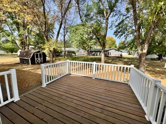 deck featuring a storage unit