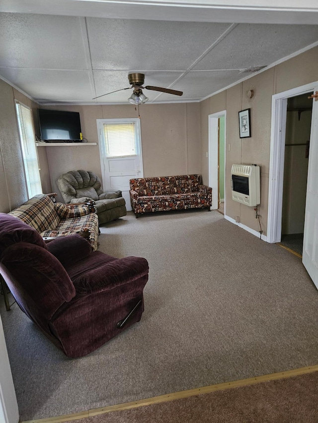 213 Iowa Ave, Halma, MN 56729 - living area with ceiling fan, carpet flooring, and heating unit