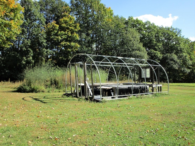 view of community featuring a lawn