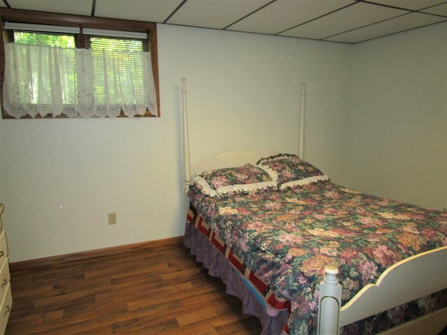 bedroom featuring dark hardwood / wood-style flooring