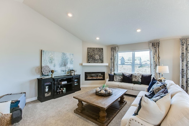 living room with carpet floors and vaulted ceiling