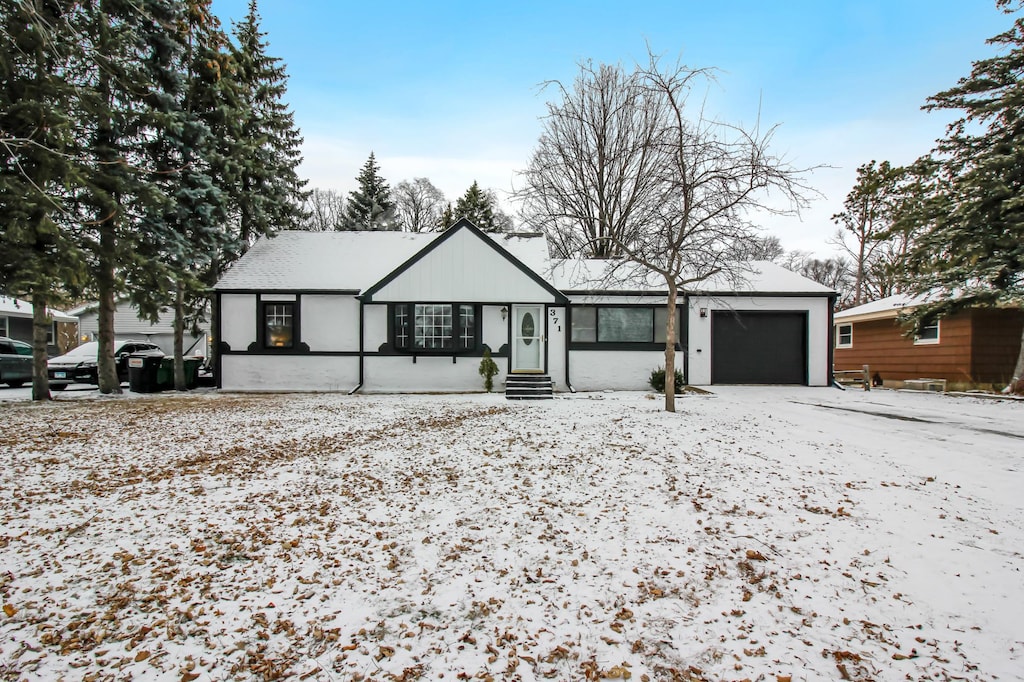 ranch-style house with a garage