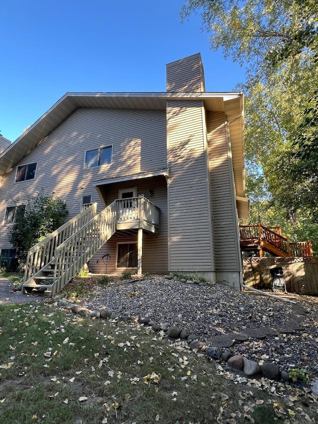 rear view of house with a deck