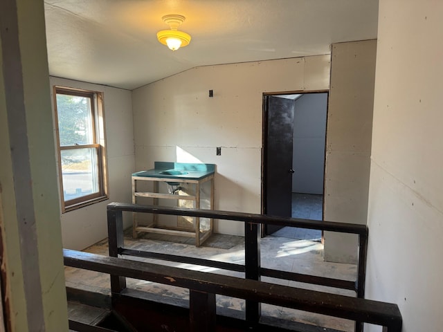 interior space featuring lofted ceiling