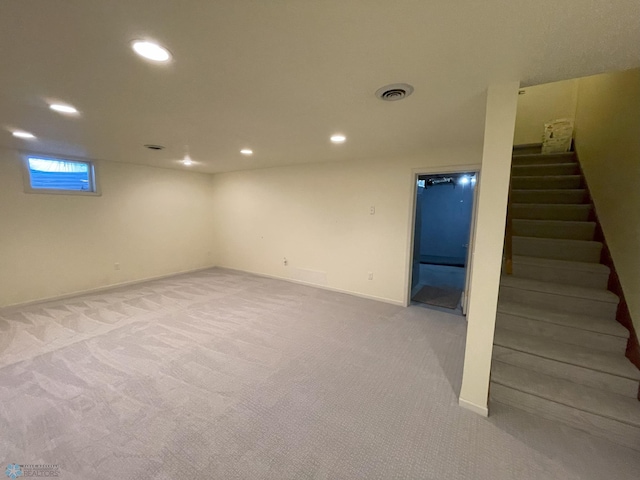 basement with light carpet