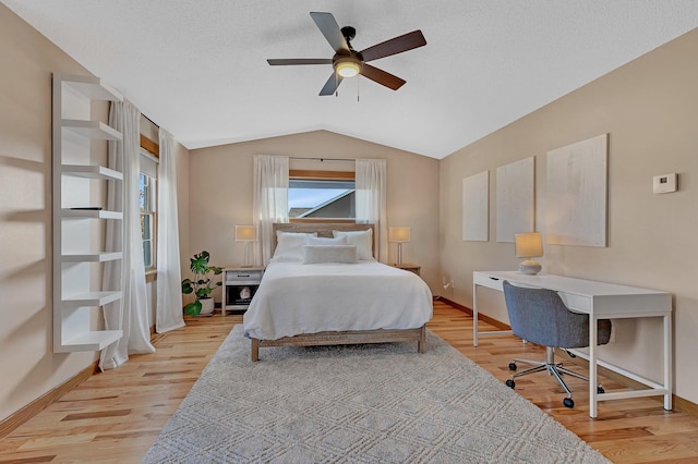 2008 11th St N, Sartell, MN 56377 - bedroom featuring baseboards, lofted ceiling, light wood finished floors, and a desk