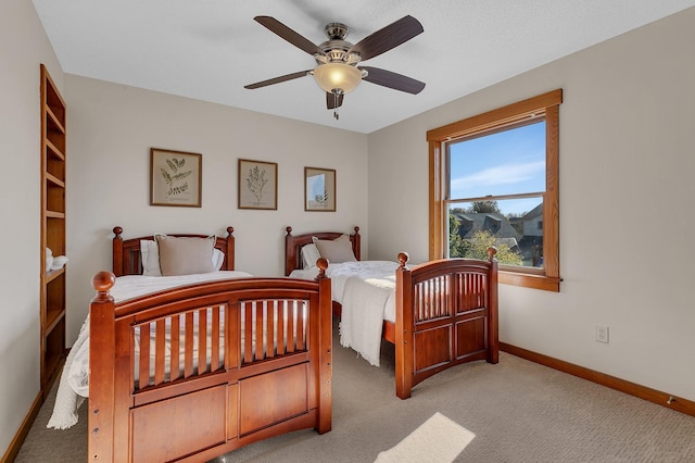 2008 11th St N, Sartell, MN 56377 - bedroom featuring light colored carpet, baseboards, and a ceiling fan