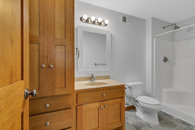 2008 11th St N, Sartell, MN 56377 - full bath featuring walk in shower, toilet, a textured ceiling, vanity, and baseboards