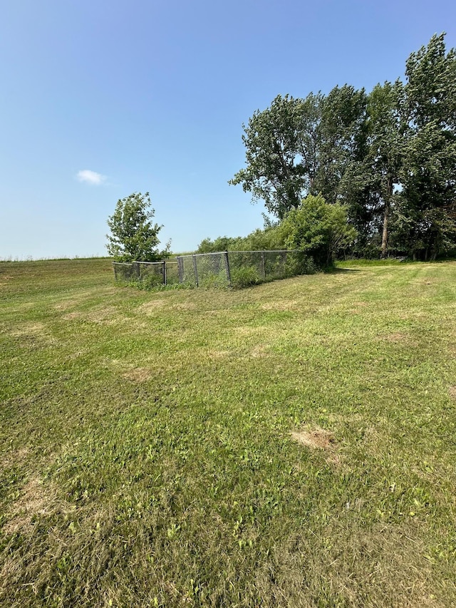 view of yard with a rural view