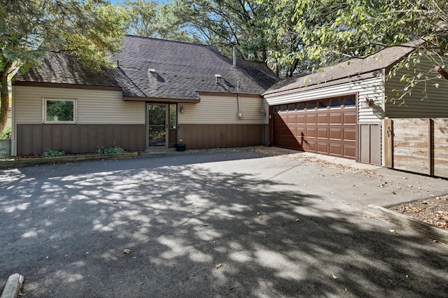 exterior space with a garage