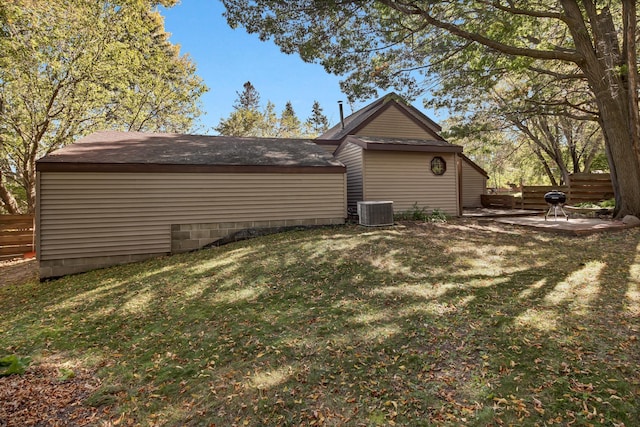 view of yard with cooling unit and a patio area