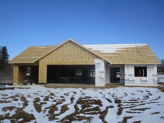 property under construction featuring an attached garage