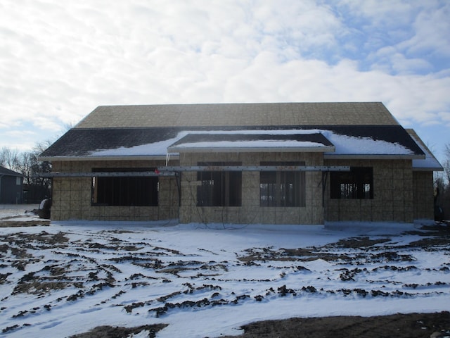 view of snow covered property