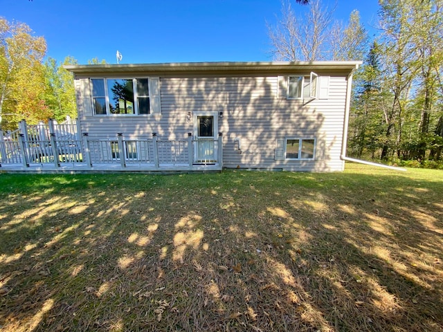 back of house with a yard