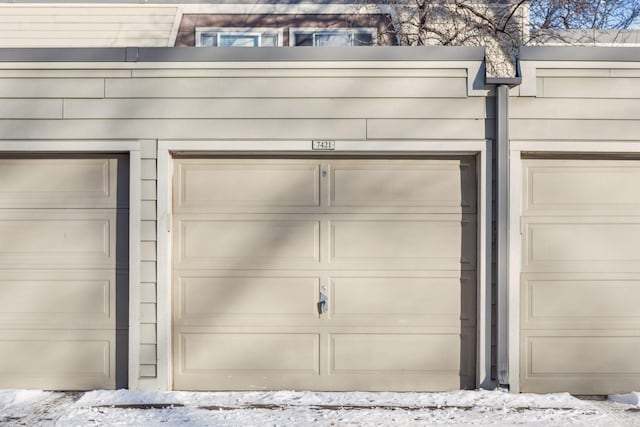 view of snow covered garage